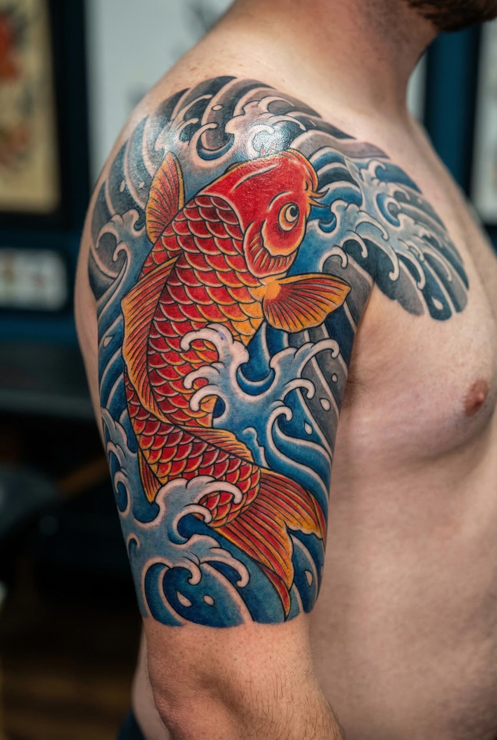 A traditional Japanese Irezumi-style koi fish tattoo swimming upstream through crashing ocean waves on a half-sleeve com
