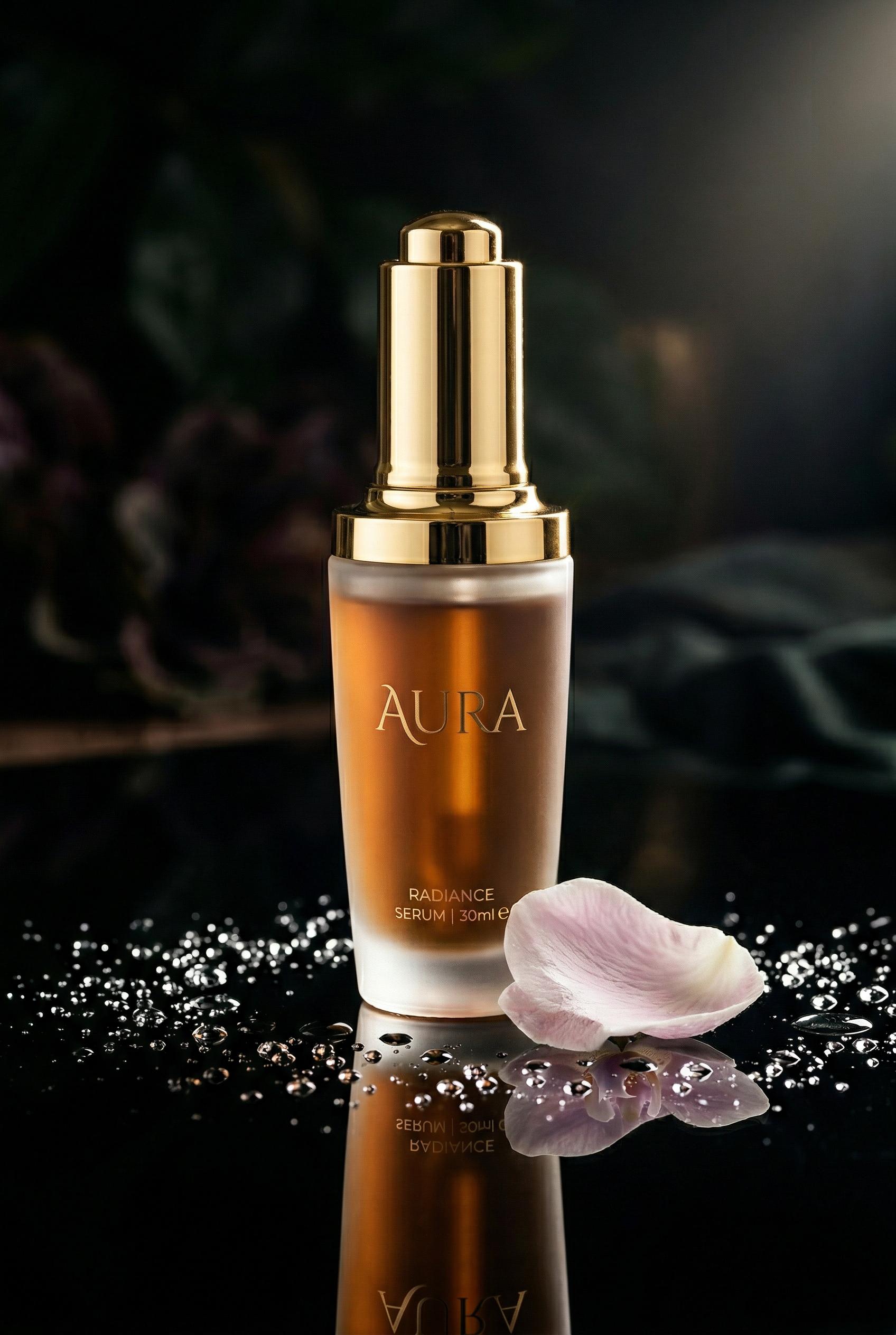 A luxury skincare serum bottle with a tall frosted glass body and gleaming gold dropper cap, standing on a perfectly ref