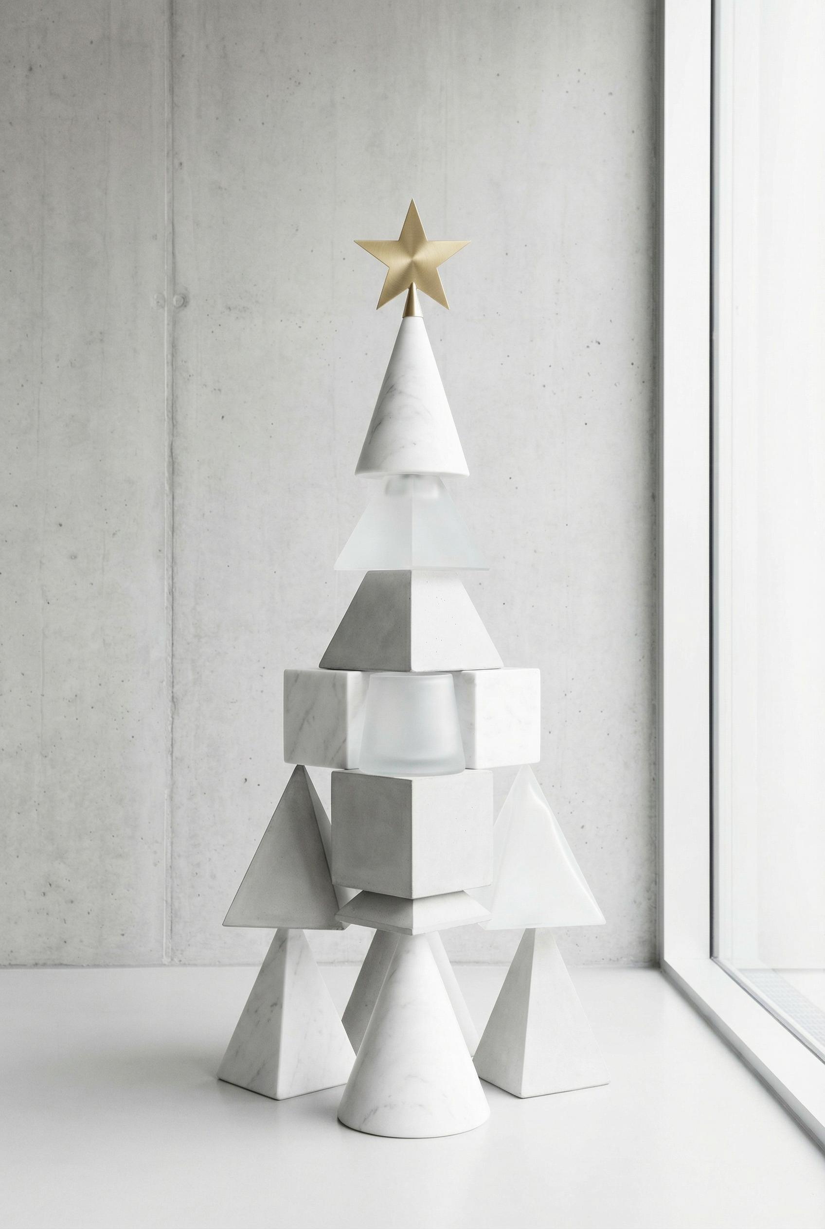 Minimalist Christmas tree design with geometric shapes, clean lines, monochromatic color scheme with one gold accent
