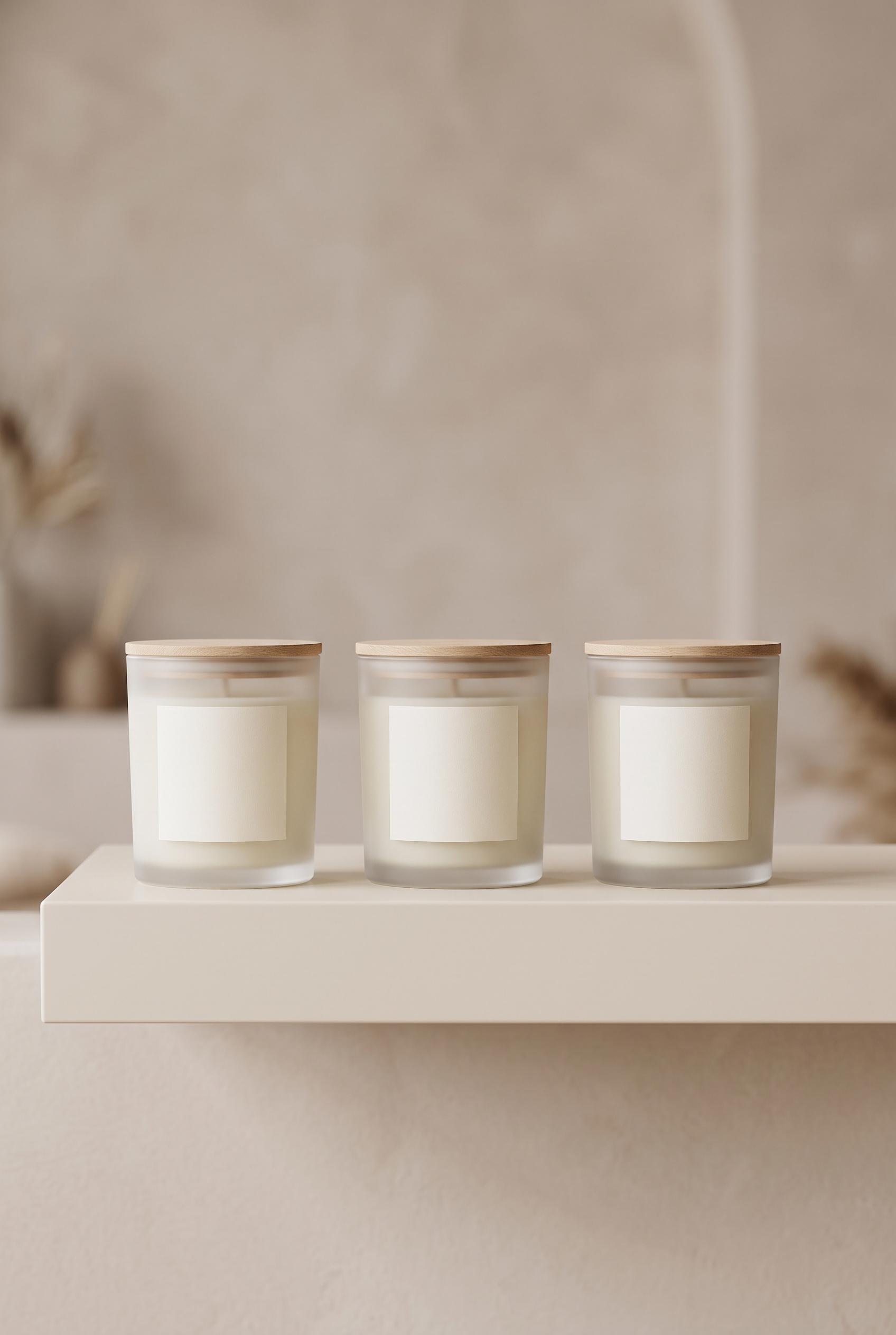 Create a vertical 2:3 composition featuring a clean, minimal design for an aromatic candle collectio
