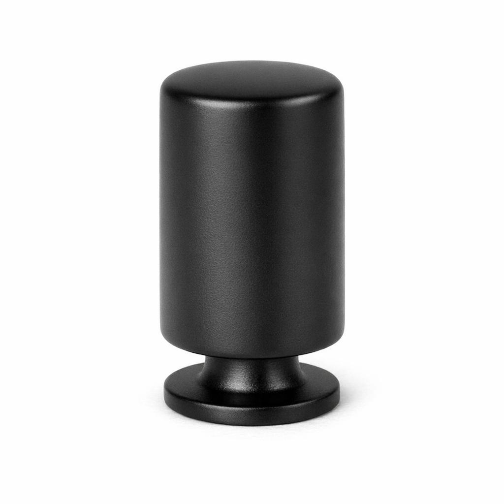 Commercial product photograph. A single residential cabinet knob. Smooth surface texture. Round Knob shape....