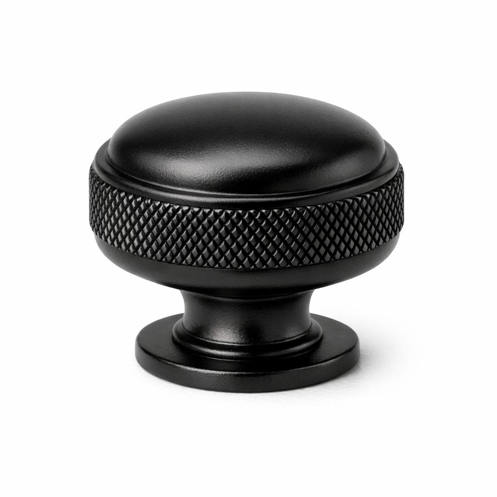 Commercial product photograph. A single residential cabinet knob. Knurled surface texture. Round Kno