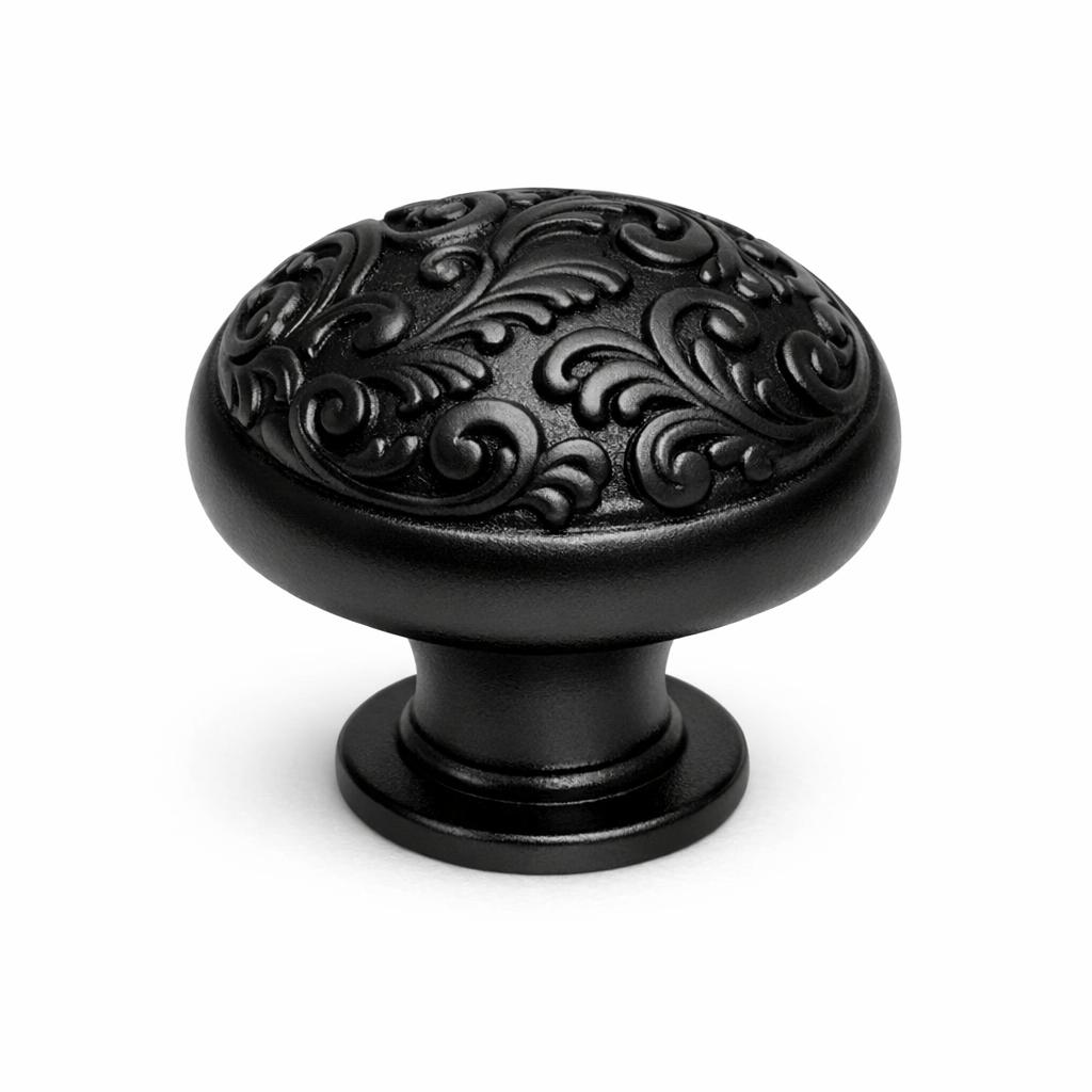 Commercial product photograph. A single residential cabinet knob. Scrollwork surface texture. Round Knob sh...
