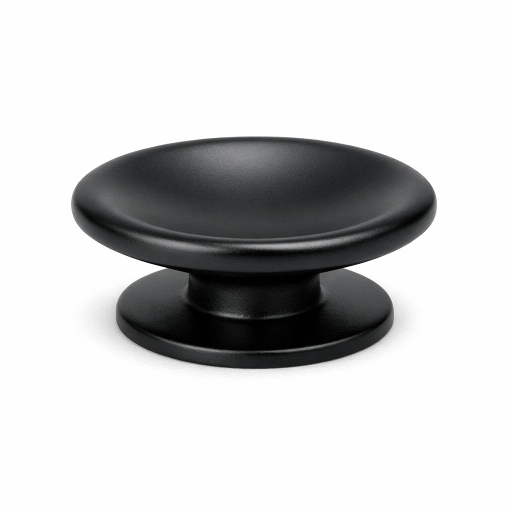 Commercial product photograph. A single residential cabinet knob. Smooth surface texture. Round Knob shape. Matte Black 