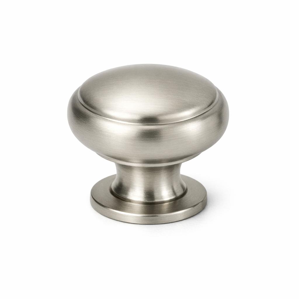 Commercial product photograph. A single residential cabinet knob. Smooth surface texture. Round Knob shape....