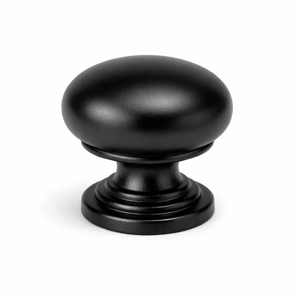 Commercial product photograph. A single residential cabinet knob. Smooth surface texture. Round Knob shape....