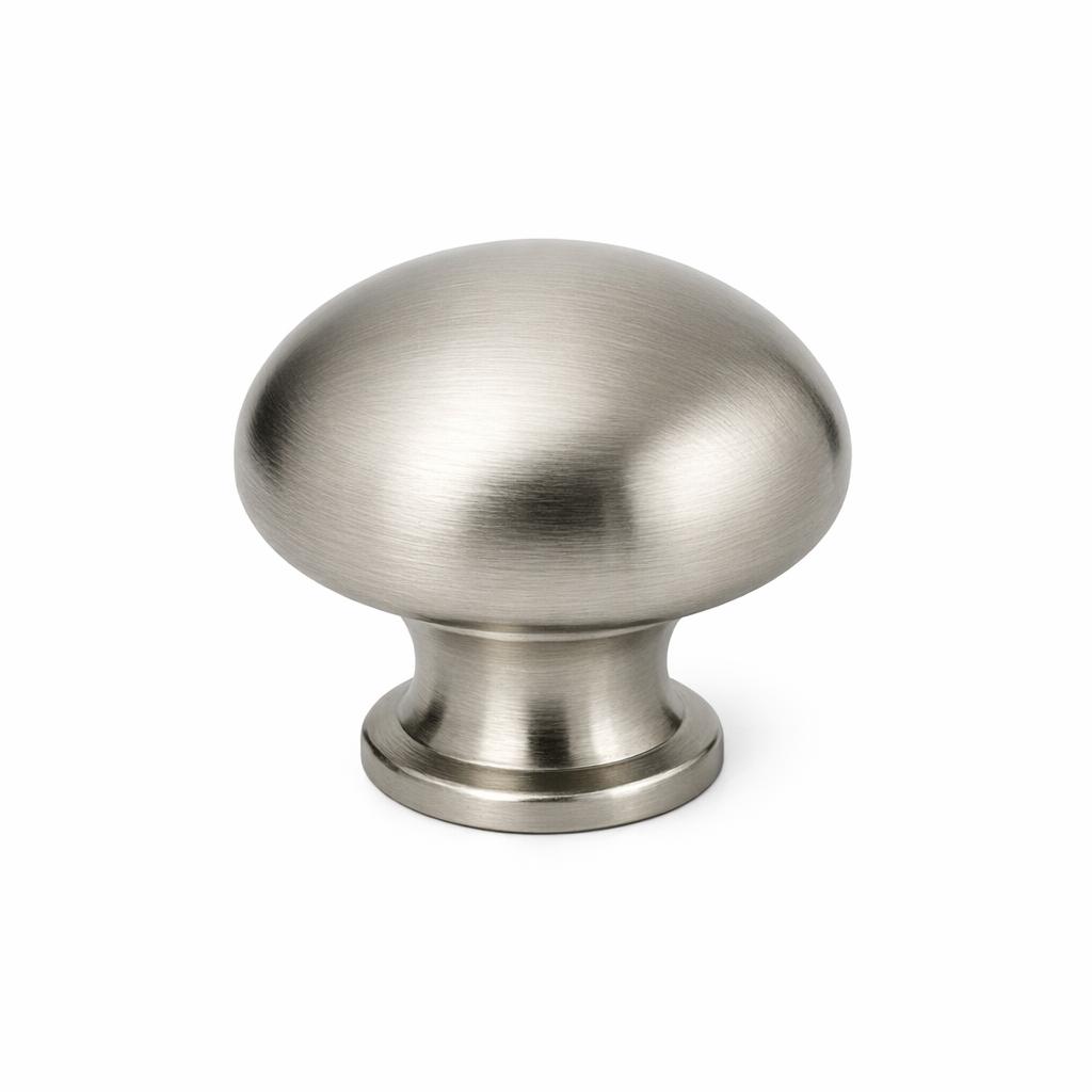 A single residential cabinet knob, smooth dome, brushed nickel, on pure white background. Product photo.