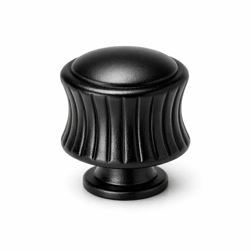 Commercial product photograph. A single residential cabinet knob. Ribbed surface texture. Round Knob shape. Matte Black 