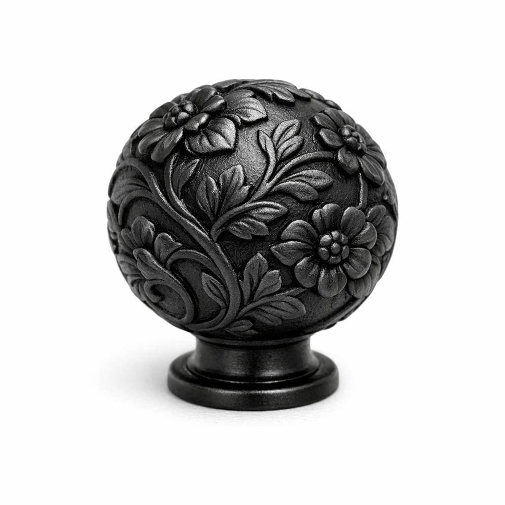 Commercial product photograph. A single residential cabinet knob. Floral surface texture. Round Knob shape....