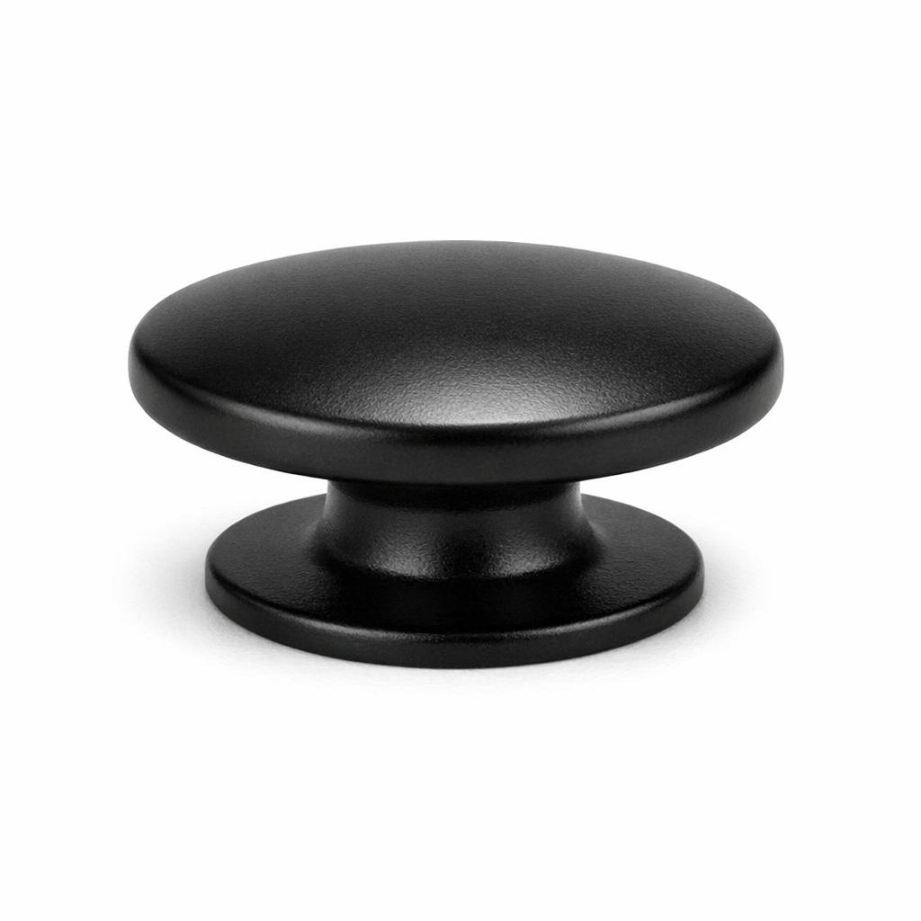 Commercial product photograph. A single residential cabinet knob. Smooth surface texture. Round Knob shape....