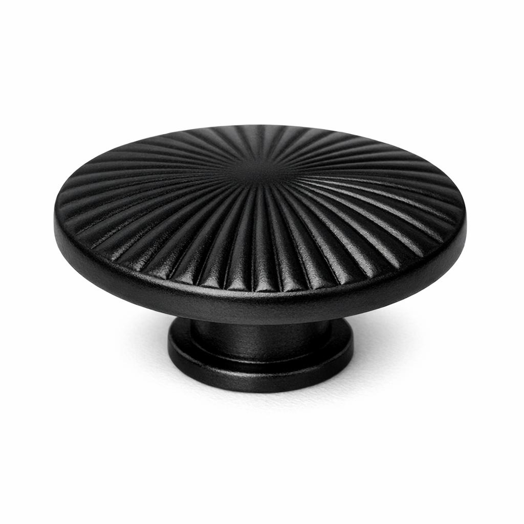 Commercial product photograph. A single residential cabinet knob. Ribbed surface texture. Round Knob shape....