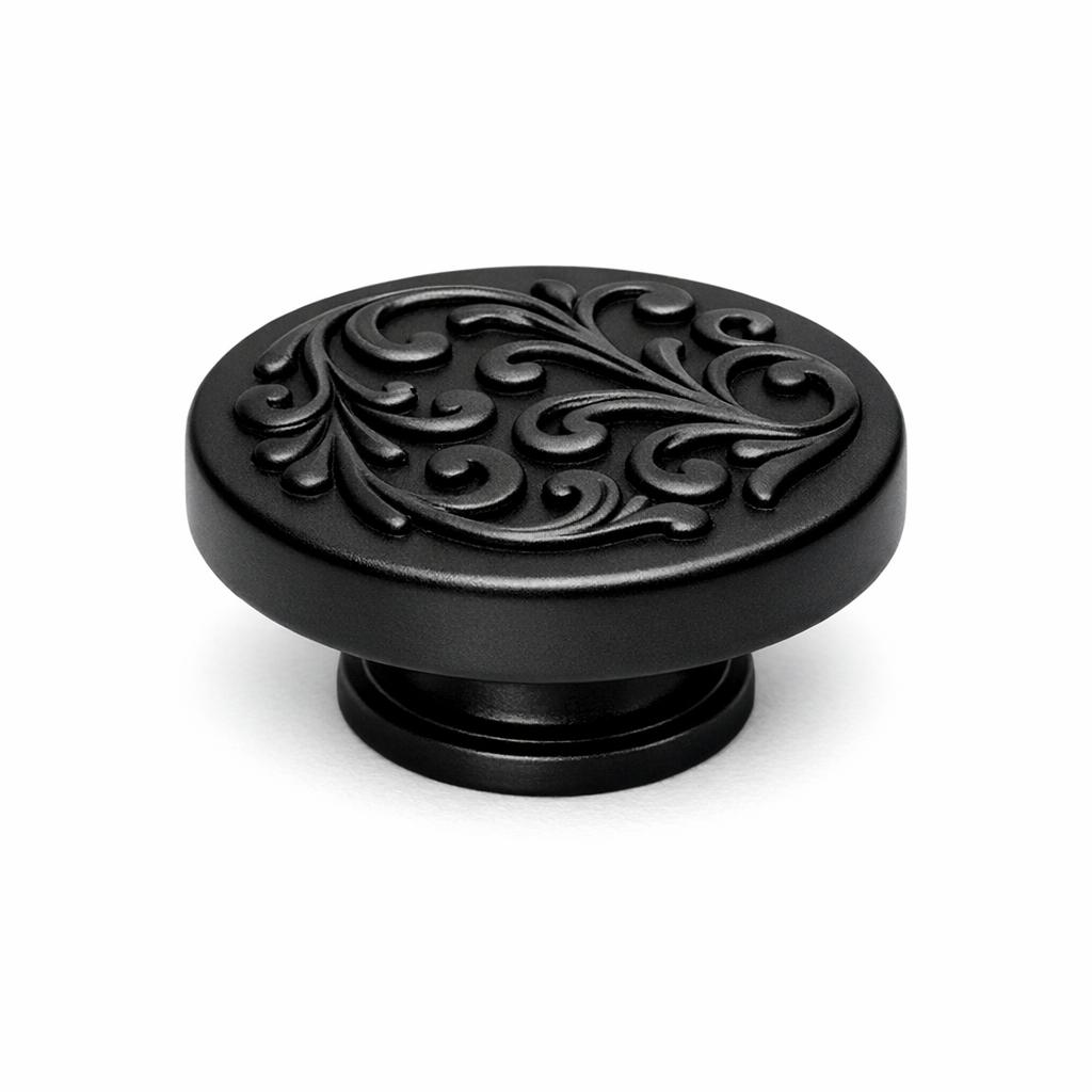 Commercial product photograph. A single residential cabinet knob. Scrollwork surface texture. Round Knob sh...
