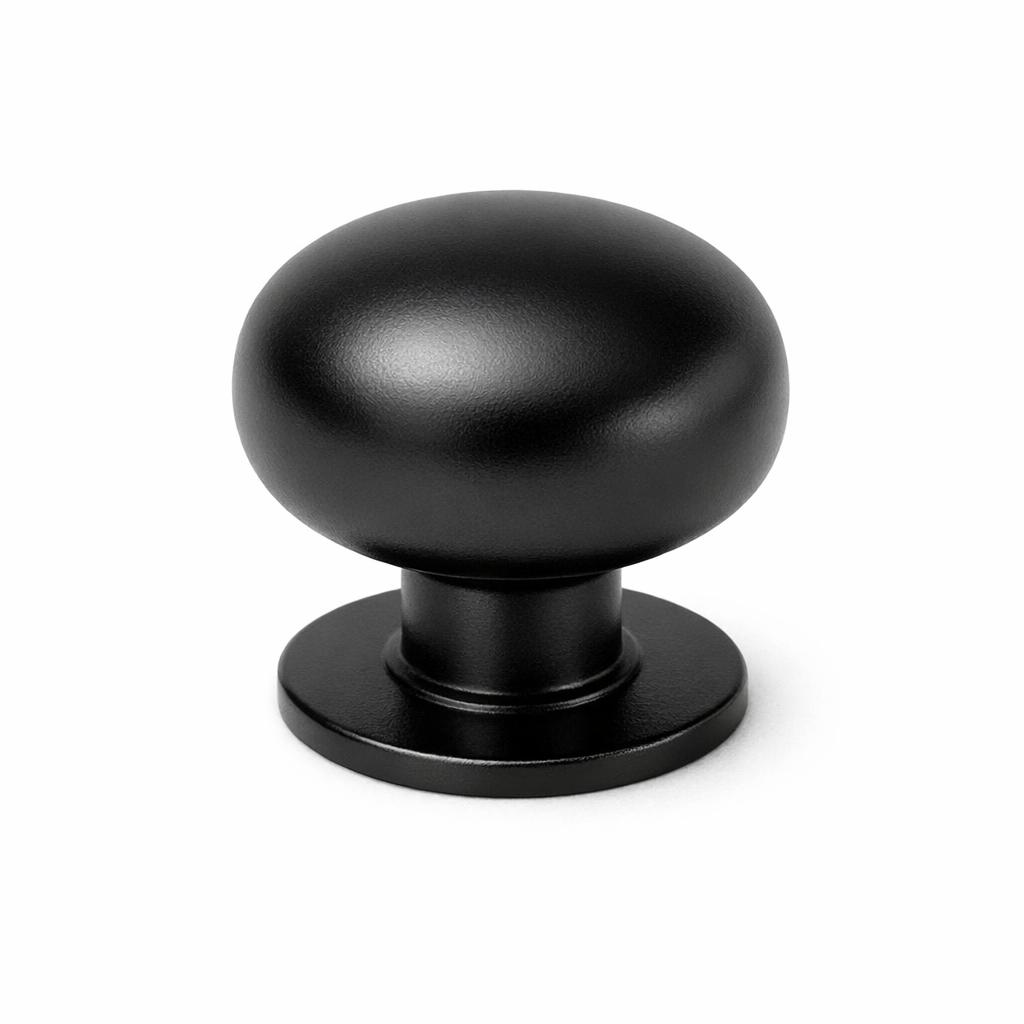 Commercial product photograph. A single residential cabinet knob. Smooth surface texture. Round Knob shape. Matte Black 