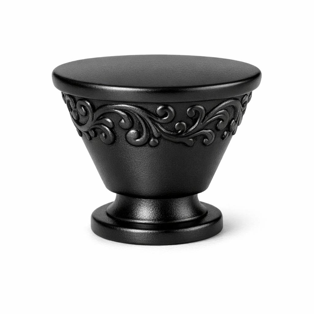 Commercial product photograph. A single residential cabinet knob. Scrollwork surface texture. Round Knob sh...