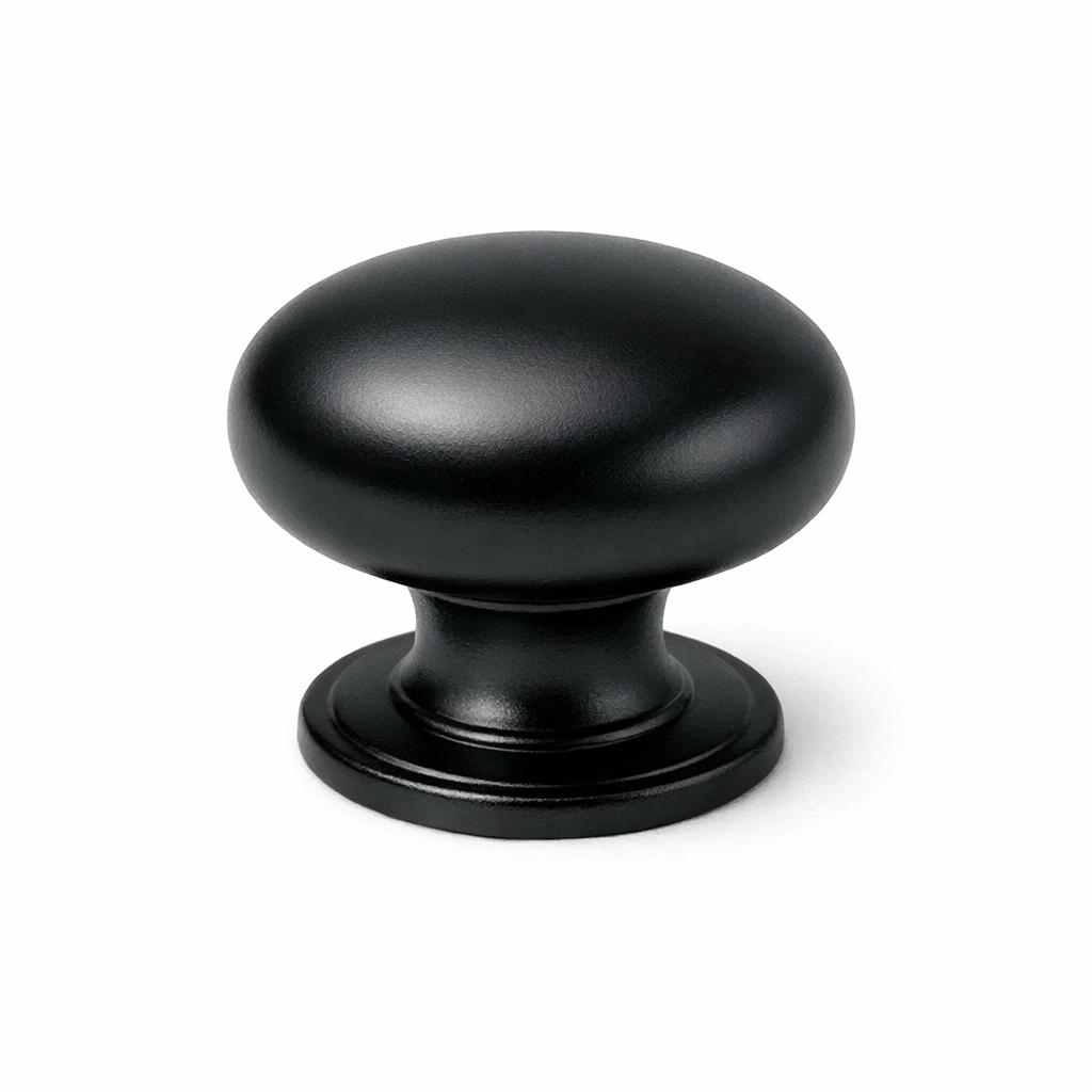 Commercial product photograph. A single residential cabinet knob. Smooth surface texture. Round Knob shape. Matte Black 