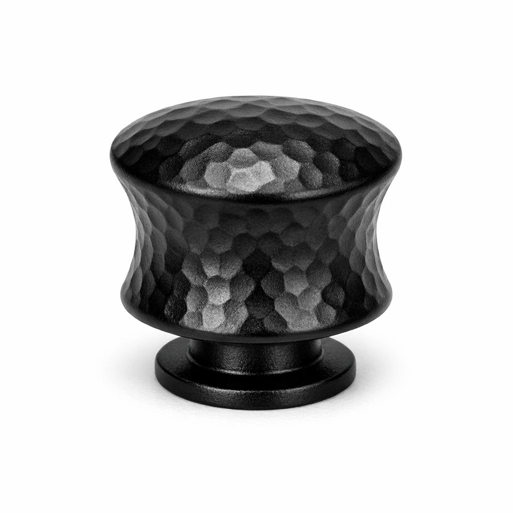 Commercial product photograph. A single residential cabinet knob. Hammered surface texture. Round Knob shap...