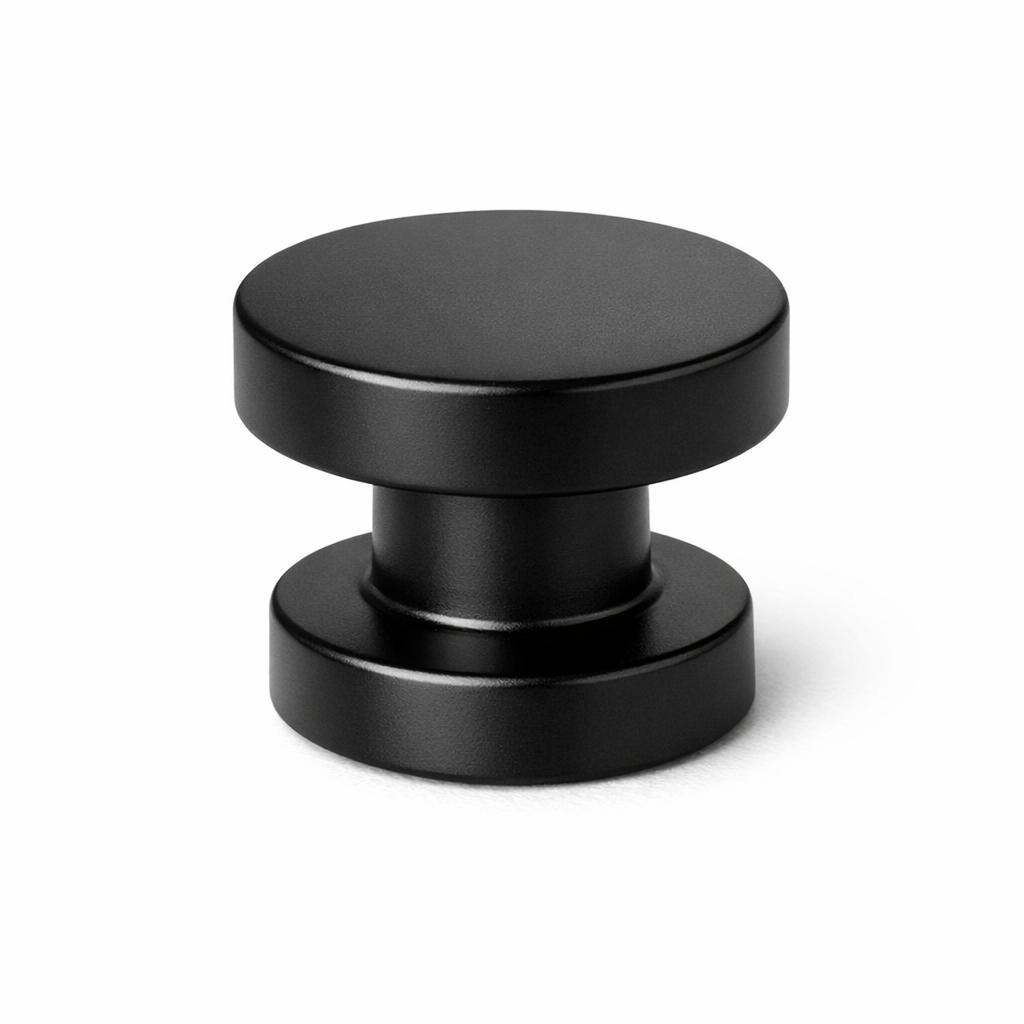 Commercial product photograph. A single residential cabinet knob. Smooth surface texture. Round Knob shape....