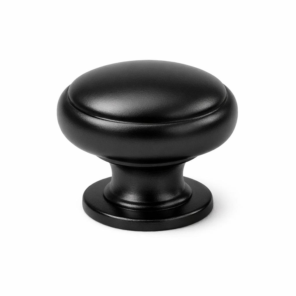 Commercial product photograph. A single residential cabinet knob. Smooth surface texture. Round Knob shape. Matte Black 