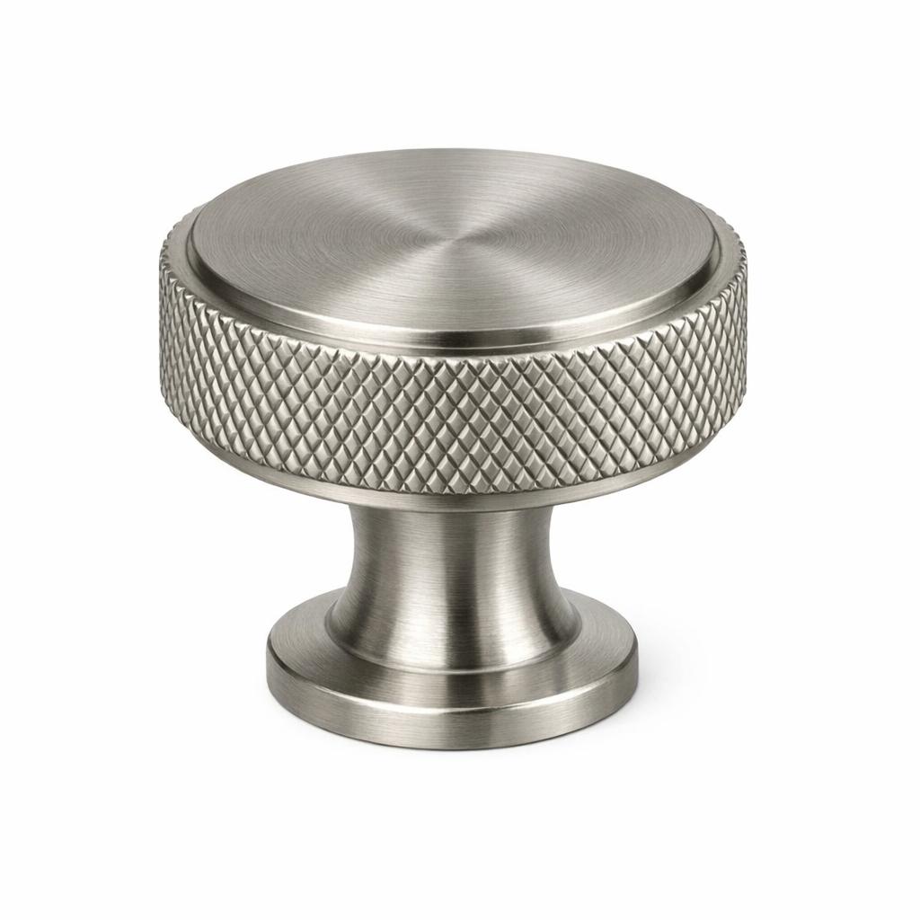 A single product photograph of a Knurled Round Knob cabinet knob in Brushed Nickel finish. Shot straight-on...