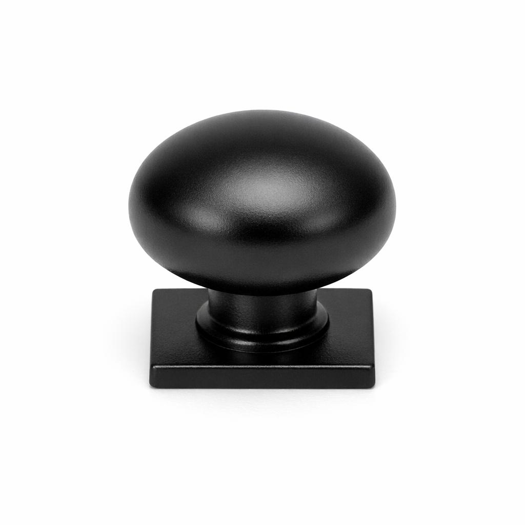 Commercial product photograph. A single residential cabinet knob. Smooth surface texture. Round Knob shape....