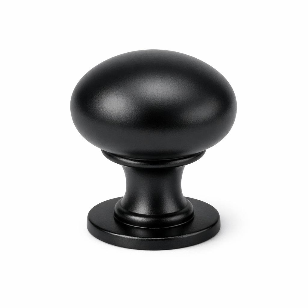 Commercial product photograph. A single residential cabinet knob. Smooth surface texture. Round Knob shape. Matte Black metal finish. Small circular base plate, single mounting post, approximately 1-1/4 inch diameter. Photographed on pure white seamless background (#FFFFFF). Studio softbox lighting, soft shadow directly underneath only. Macro lens, sharp focus throughout. Photorealistic real metal hardware. Not a 3D render. Not an illustration. Not CGI. Real cabinet hardware product photography quality. Variation 4: Round cabinet knob. Smooth dome top, longer neck with ring detail at base of dome, circular base plate. Transitional style..