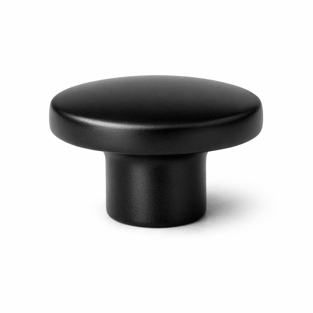 Commercial product photograph. A single residential cabinet knob. Smooth surface texture. Round Knob shape....
