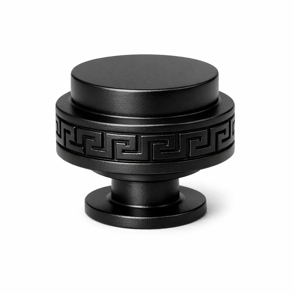 Commercial product photograph. A single residential cabinet knob. Geometric surface texture. Round K