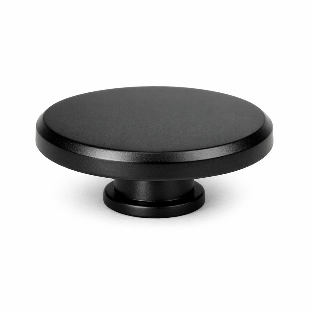 Commercial product photograph. A single residential cabinet knob. Smooth surface texture. Round Knob shape....