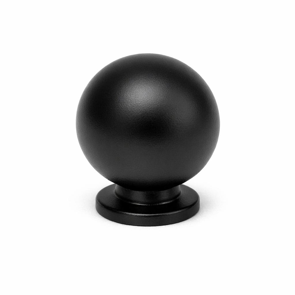 Commercial product photograph. A single residential cabinet knob. Smooth surface texture. Round Knob shape. Matte Black 