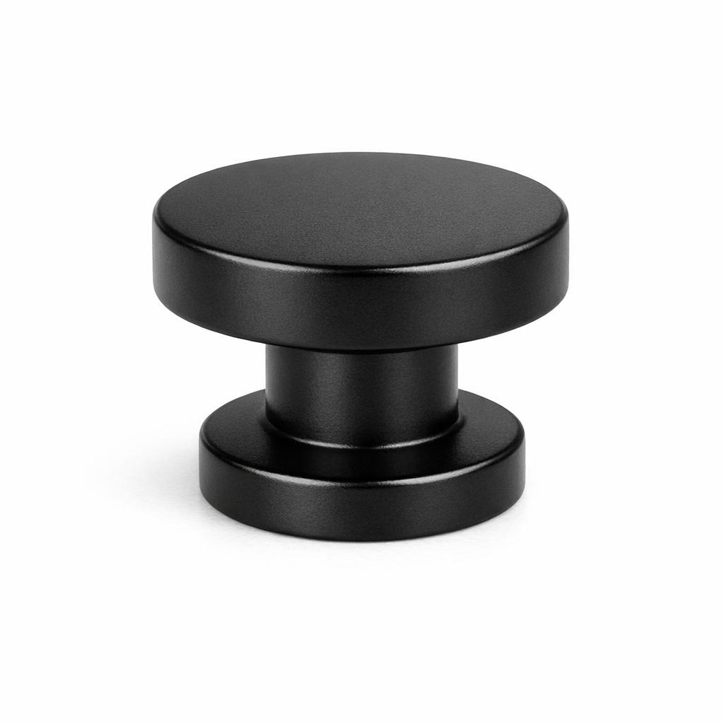 Commercial product photograph. A single residential cabinet knob. Smooth surface texture. Round Knob shape....