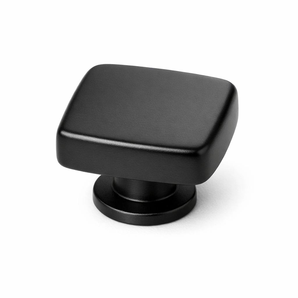 Commercial product photograph. A single residential cabinet knob. Smooth surface texture. Round Knob shape. Matte Black 