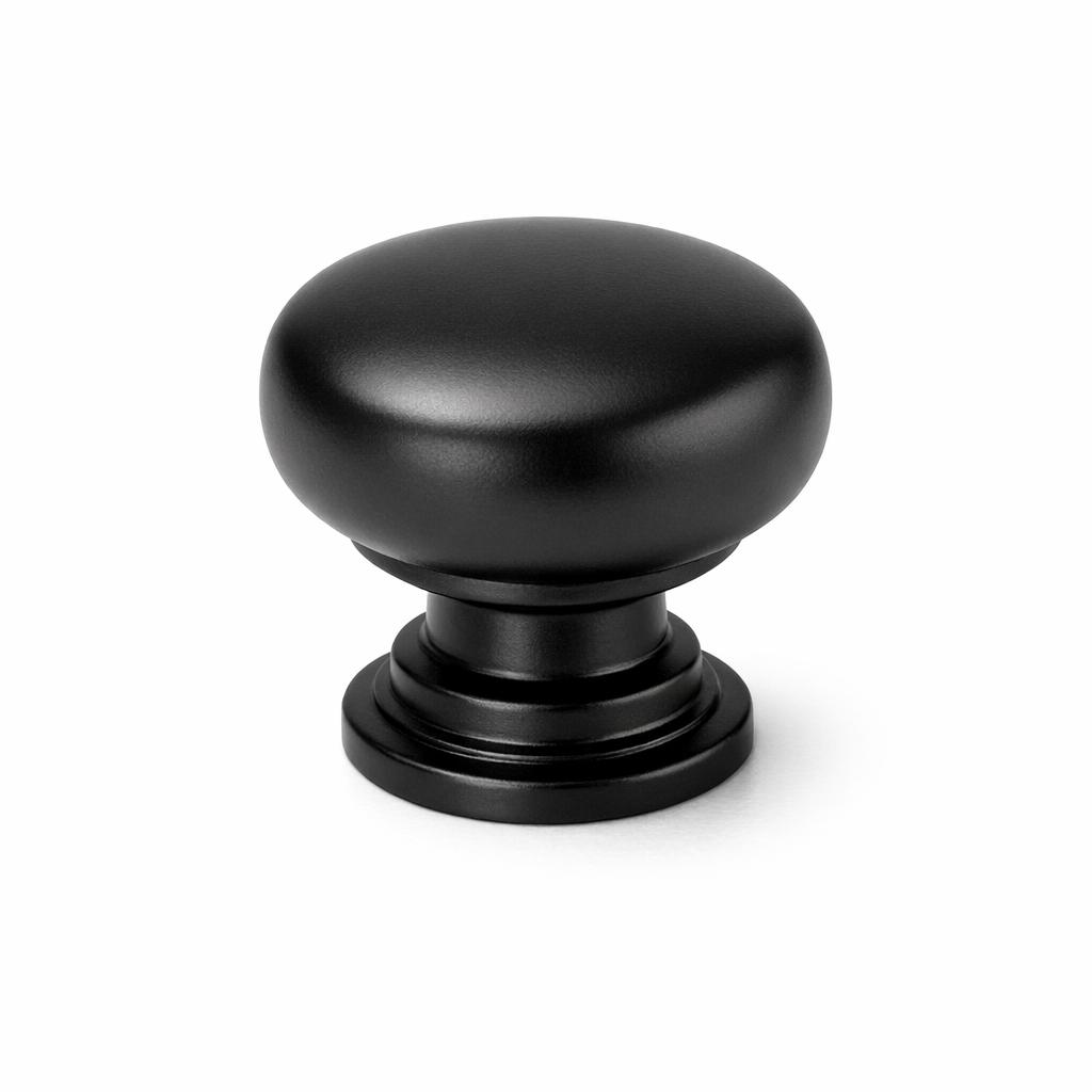 Commercial product photograph. A single residential cabinet knob. Smooth surface texture. Round Knob shape. Matte Black 