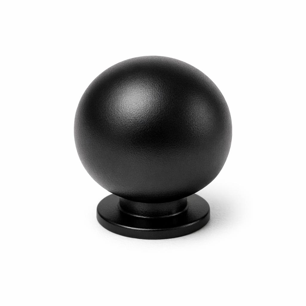 Commercial product photograph. A single residential cabinet knob. Smooth surface texture. Round Knob shape....