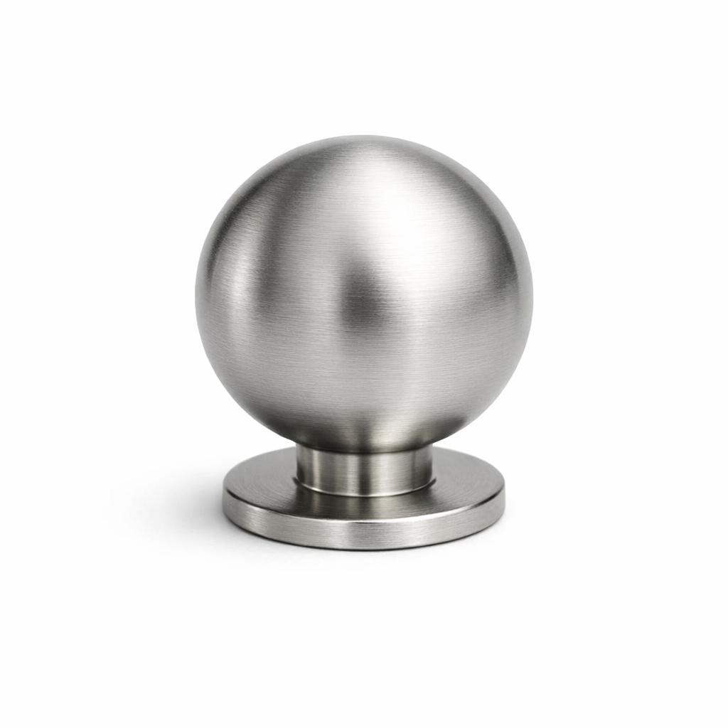 Commercial product photograph. A single residential cabinet knob. Smooth surface texture. Round Knob shape....