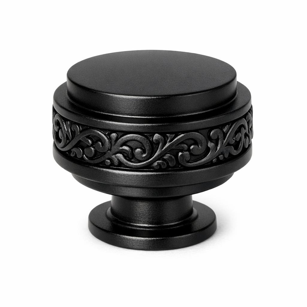 Commercial product photograph. A single residential cabinet knob. Scrollwork surface texture. Round Knob sh...