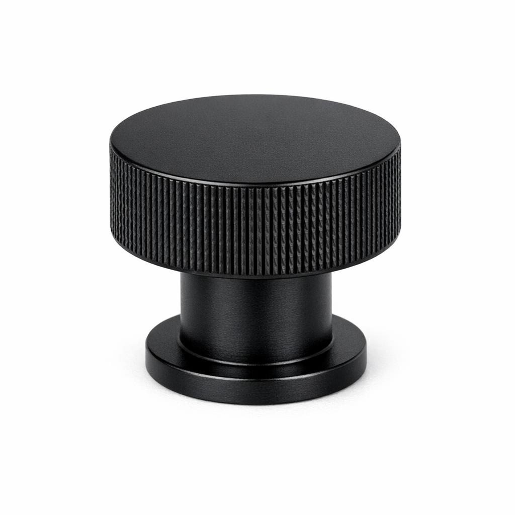 Commercial product photograph. A single residential cabinet knob. Knurled surface texture. Round Knob shape...