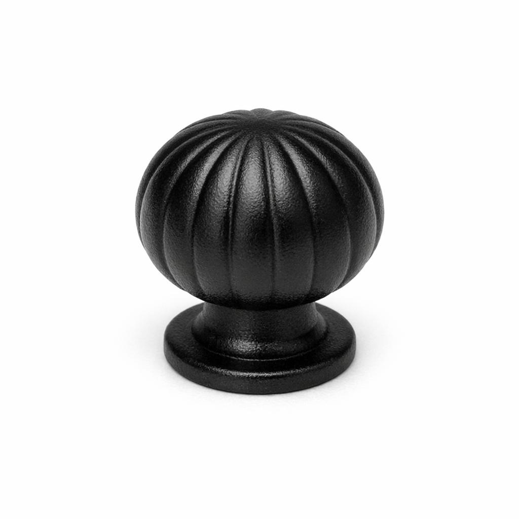 Commercial product photograph. A single residential cabinet knob. Smooth surface texture. Round Knob shape. Matte Black 