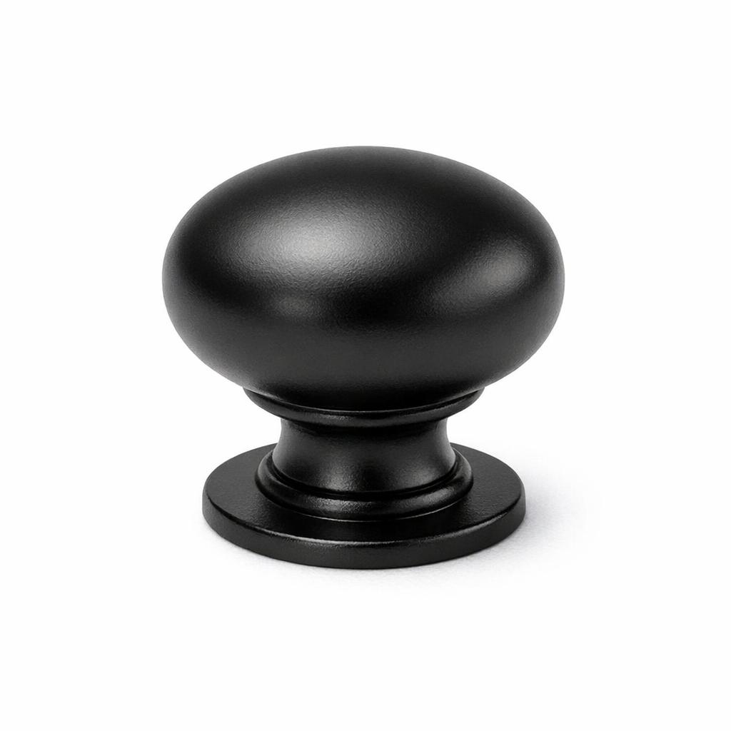 Commercial product photograph. A single residential cabinet knob. Smooth surface texture. Round Knob shape. Matte Black 
