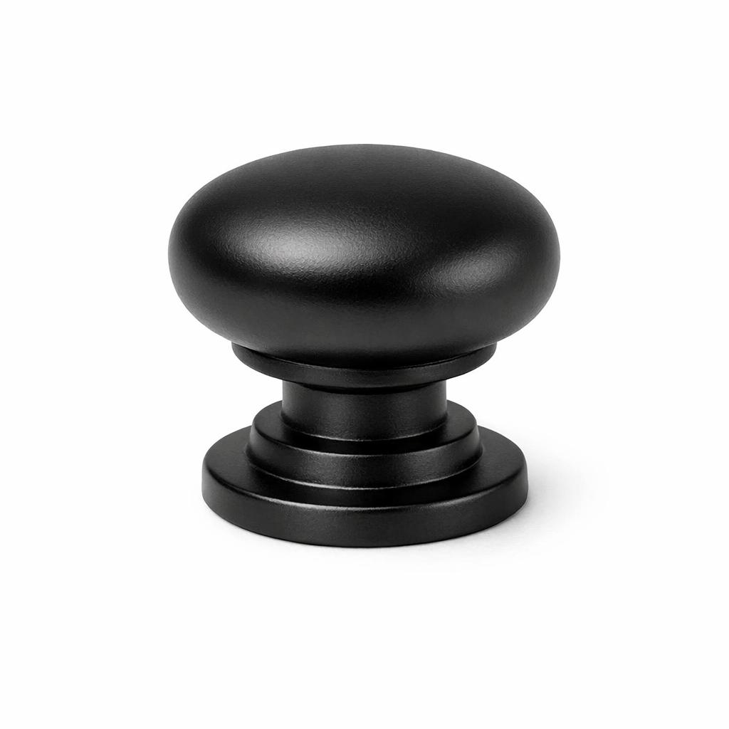 Commercial product photograph. A single residential cabinet knob. Smooth surface texture. Round Knob shape....