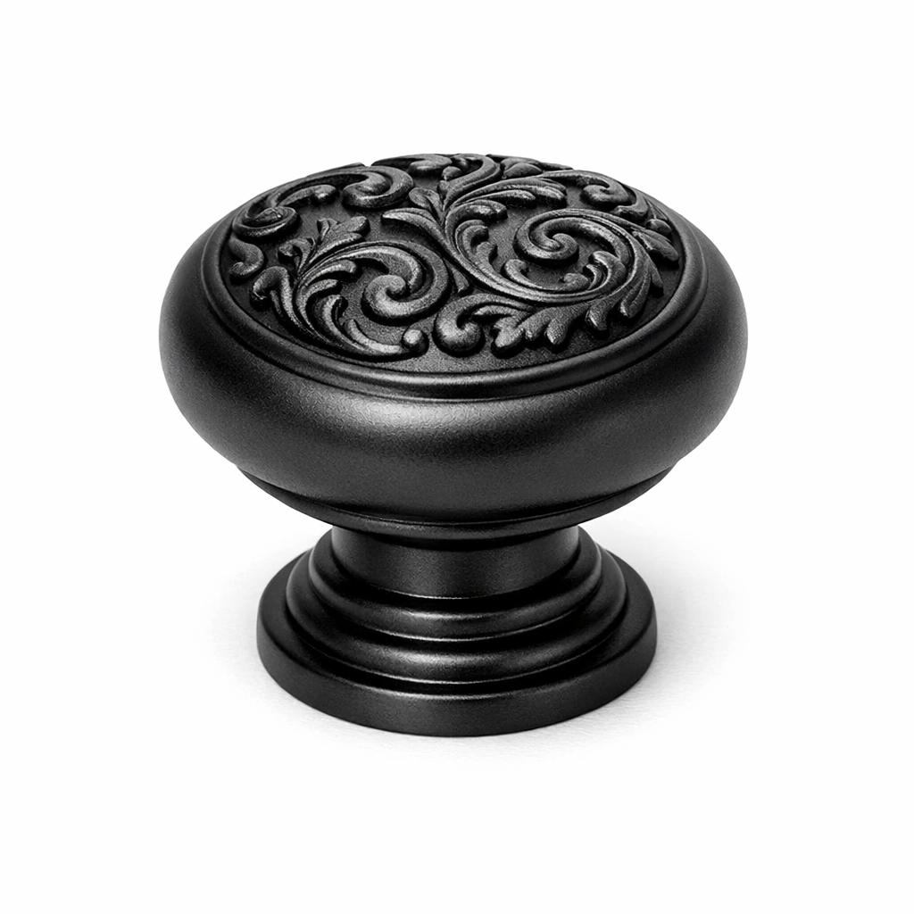 Commercial product photograph. A single residential cabinet knob. Scrollwork surface texture. Round Knob sh...