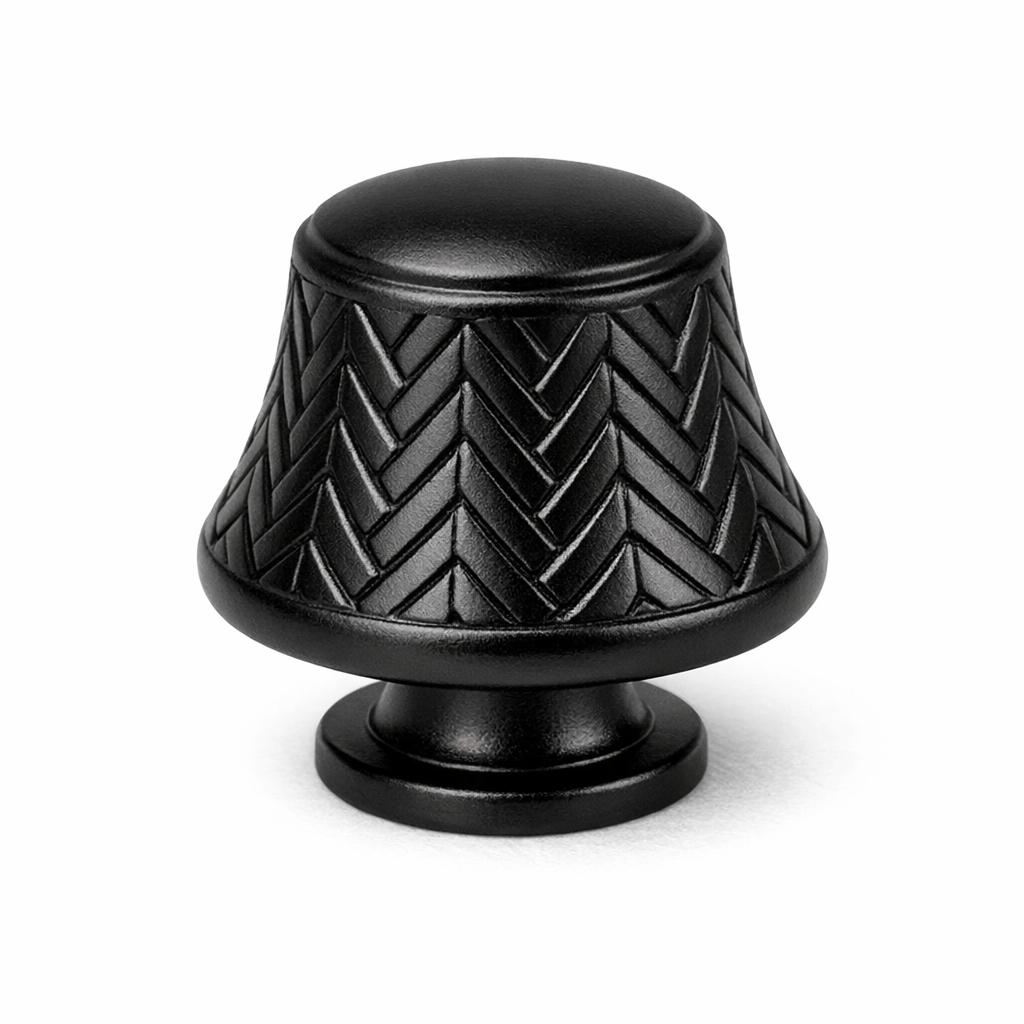 Commercial product photograph. A single residential cabinet knob. Geometric surface texture. Round K