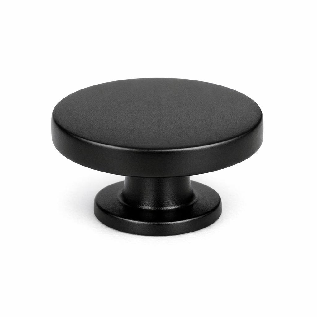 Commercial product photograph. A single residential cabinet knob. Smooth surface texture. Round Knob shape. Matte Black 