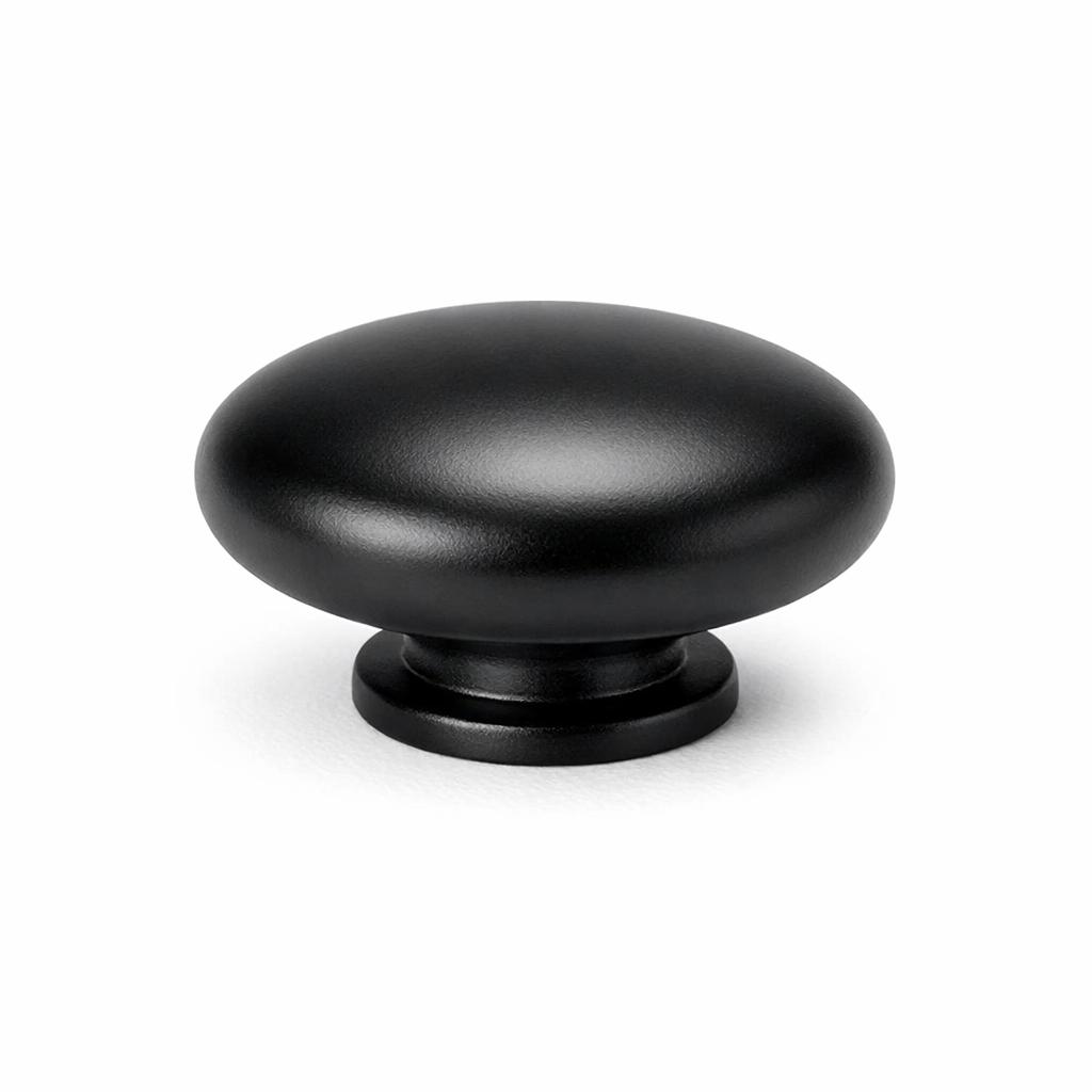 Commercial product photograph. A single residential cabinet knob. Smooth surface texture. Round Knob