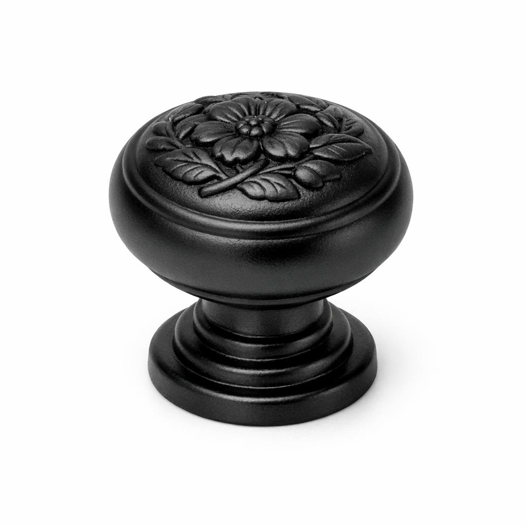 Commercial product photograph. A single residential cabinet knob. Floral surface texture. Round Knob shape....