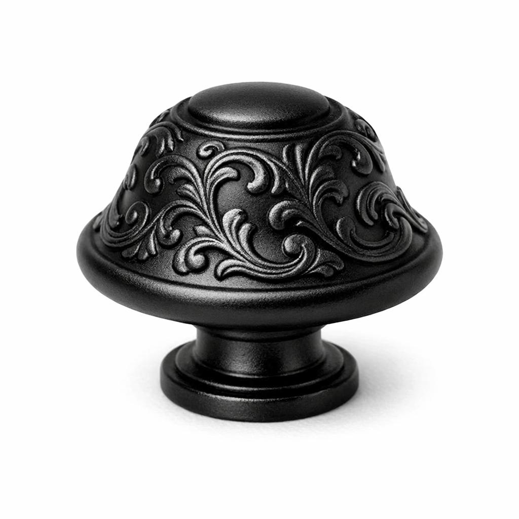 Commercial product photograph. A single residential cabinet knob. Scrollwork surface texture. Round Knob shape. Matte Bl