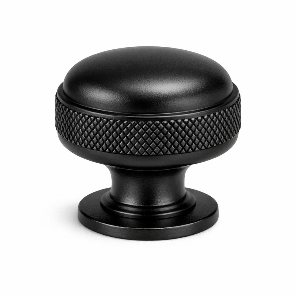 Commercial product photograph. A single residential cabinet knob. Knurled surface texture. Round Knob shape...
