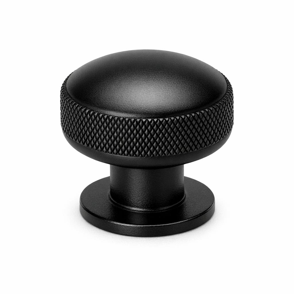 Commercial product photograph. A single residential cabinet knob. Knurled surface texture. Round Knob shape...