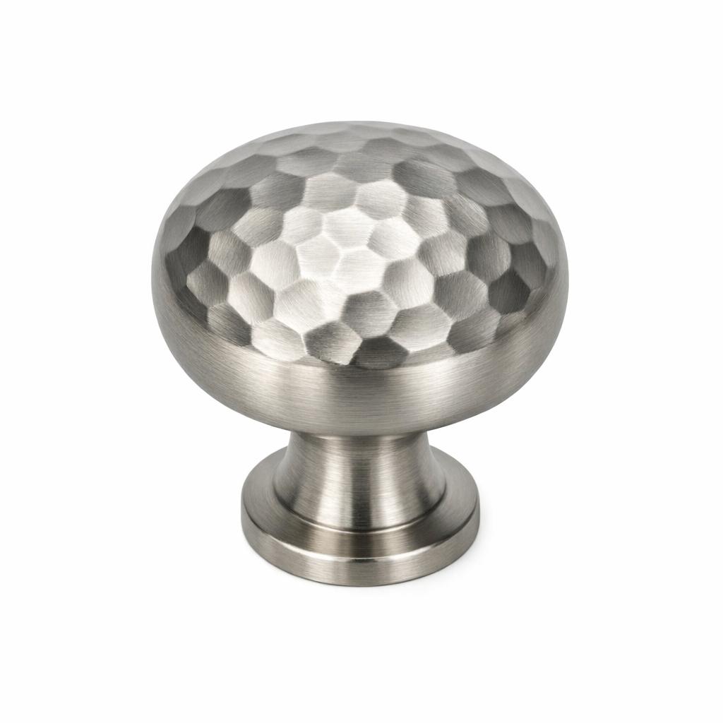 A single product photograph of a Hammered Round Knob cabinet knob in Brushed Nickel finish. Shot straight-o...