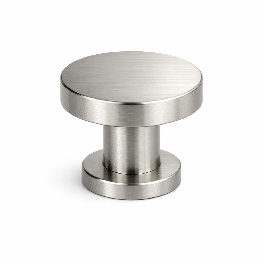 Commercial product photograph. A single residential cabinet knob. Smooth surface texture. Round Knob shape. Brushed Nickel metal finish. Small circular base plate, single mounting post, approximately 1-1/4 inch diameter. Photographed on pure white seamless background (#FFFFFF). Studio softbox lighting, soft shadow directly underneath only. Macro lens, sharp focus throughout. Photorealistic real metal hardware. Not a 3D render. Not an illustration. Not CGI. Real cabinet hardware product photography quality. Variation 4: Cadet style cabinet knob: flat circular top disc, straight cylindrical body, second wider cylinder at base, no dome. Clean modern lines. Smooth surface, no texture, no ribbing, no decorative details..
