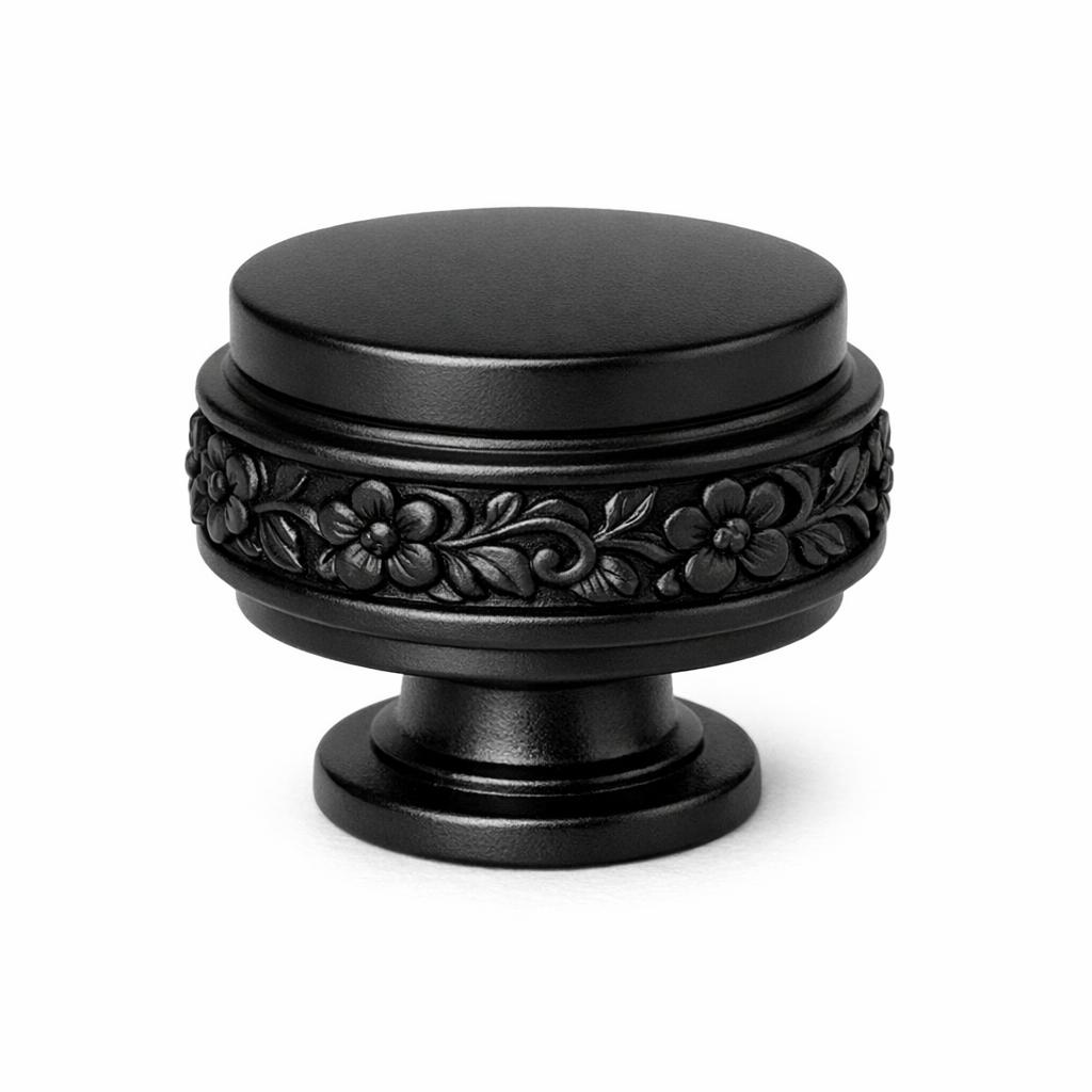 Commercial product photograph. A single residential cabinet knob. Floral surface texture. Round Knob shape....
